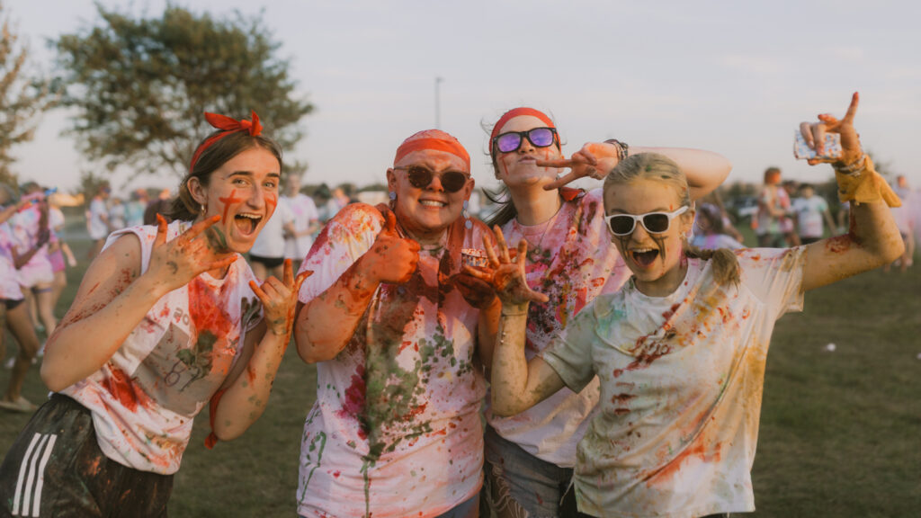 students smiling at fun outdoor event